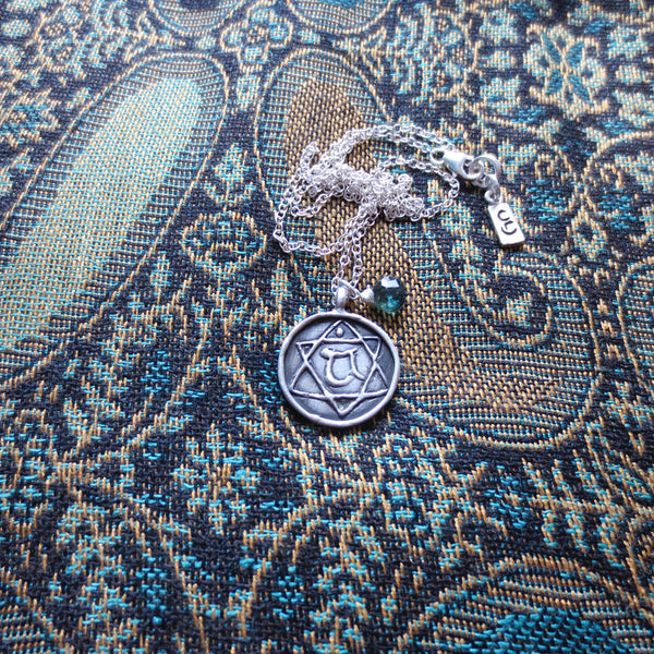 silver heart chakra necklace